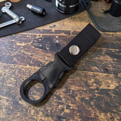 Schwarzer EDC Flaschenhalter mit Schnellverschluss für Getränke Flaschen
